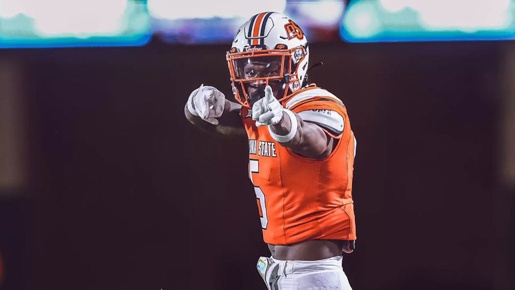 Cowboys debut new helmets, break out orange jerseys for season