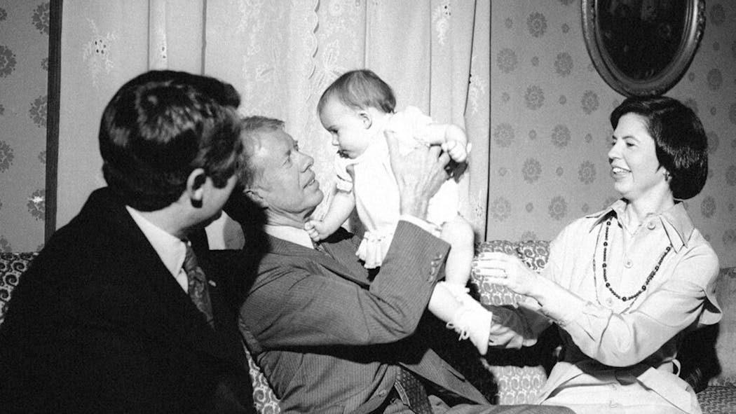 Jimmy Carter Holds A Baby In Oklahoma - Larry Wade