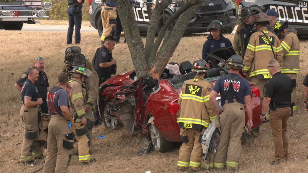 Car wrapped around tree, SB 169 