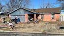 Firefighters battle Tulsa house fire amid freezing conditions