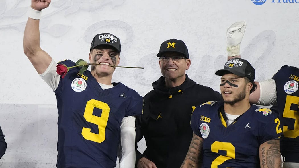 Harbaugh's Michigan Wolverines To Play For National Title After