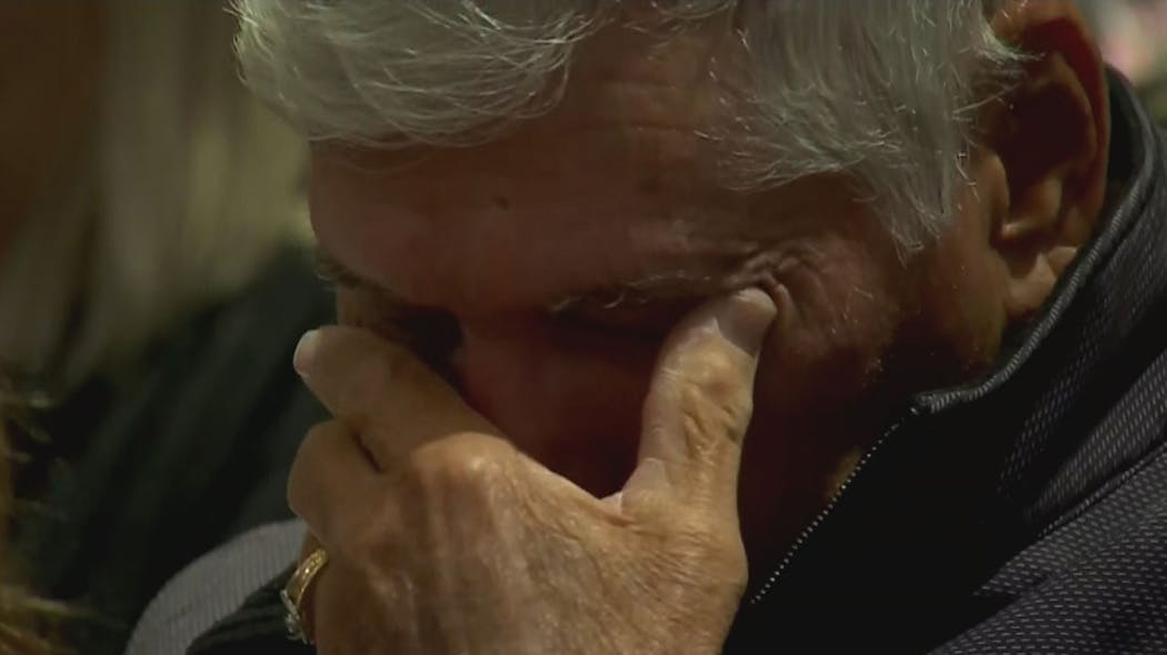 Man overcome with emotion during moment of silence