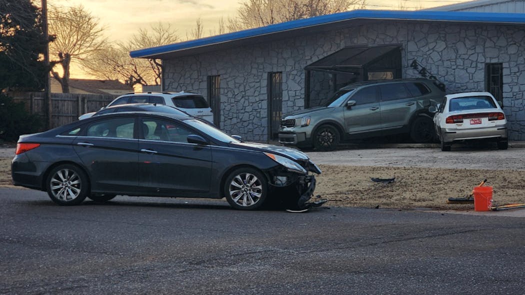 Del City wreck involving building.