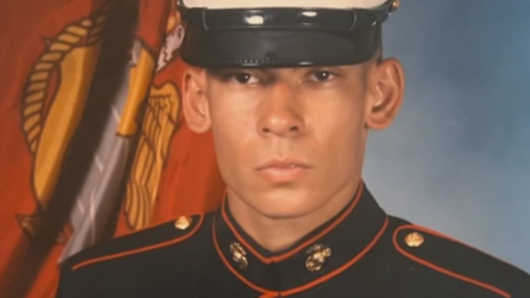 Robert Agu, 40, was a Marine veteran and father of two boys. 